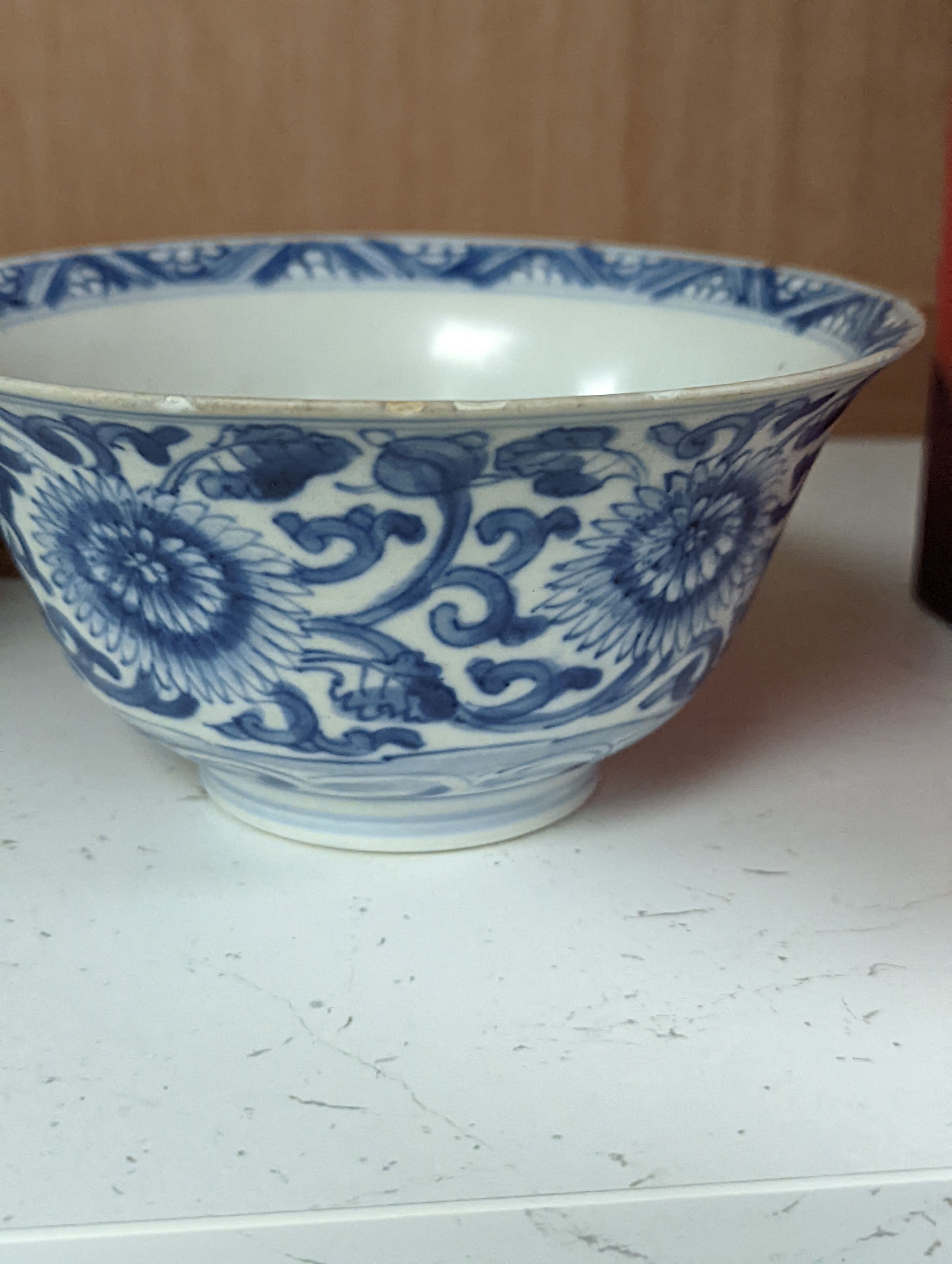 A Chinese blue and white bowl, Kangxi, 15cm. diam., a famille rose teapot stand, Yongzheng, and two doucai bowls
